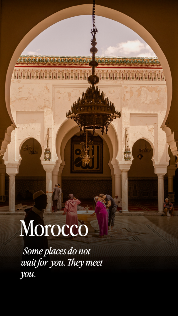 Sunset over the Sahara with camel silhouettes and a luxury desert atmosphere in Morocco